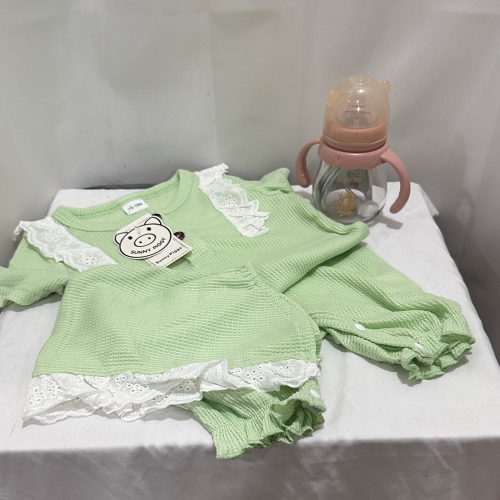 Green Baby Outfit with Lace Trim and baby bottle all new items